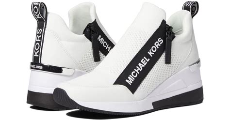 white michael kors wedges|Michael Kors women's wedge sneakers.